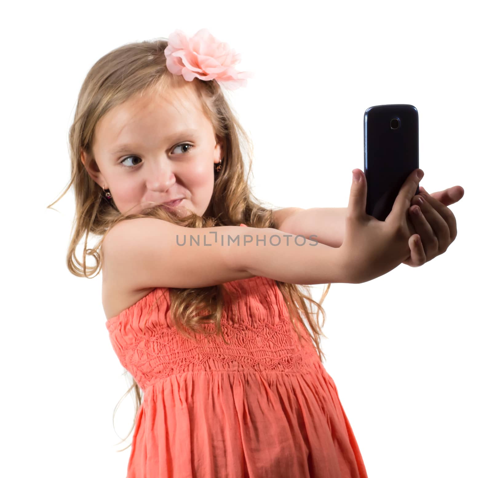 Little girl doing photo of her self over white background