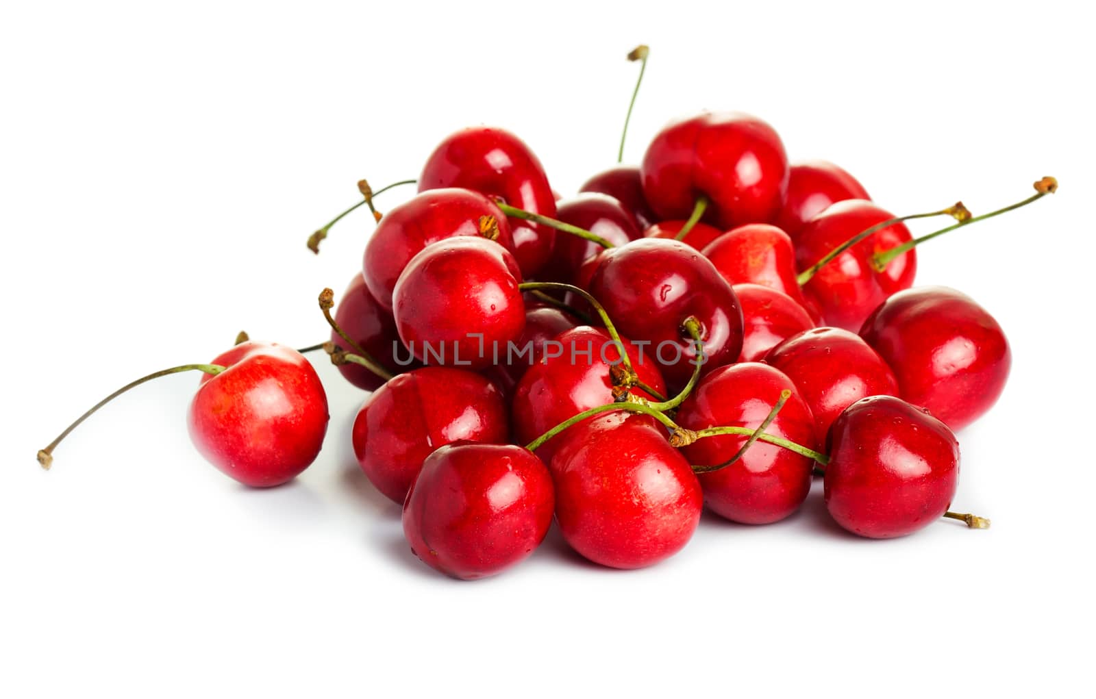 Ripe cherries isolated on white background