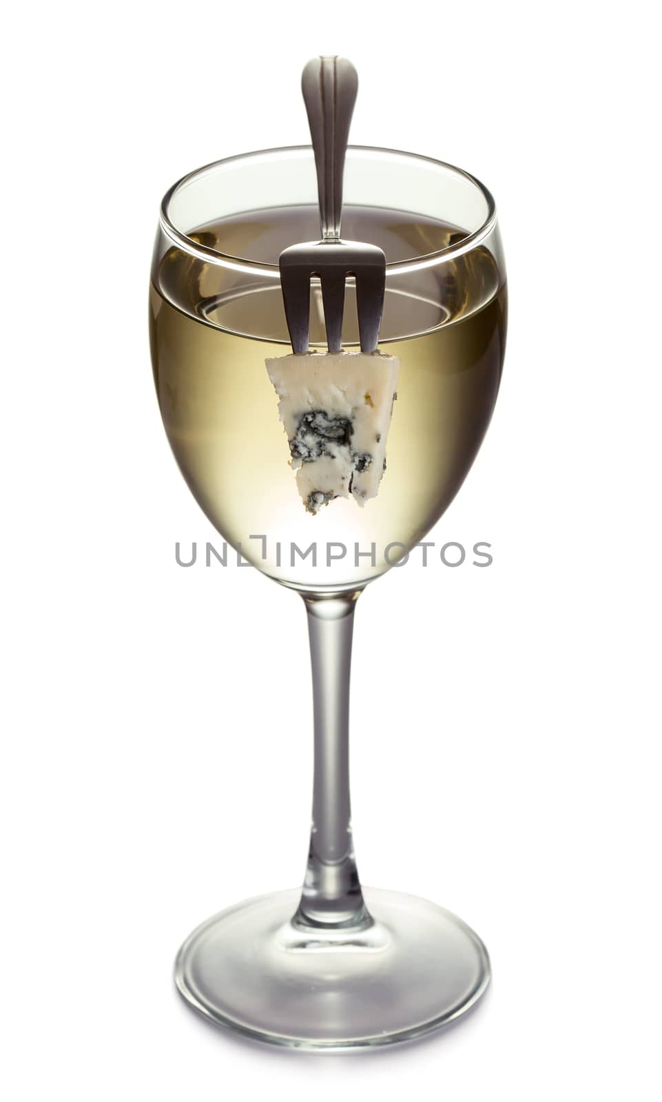 Cheese on a fork and glass with wine isolated on white background