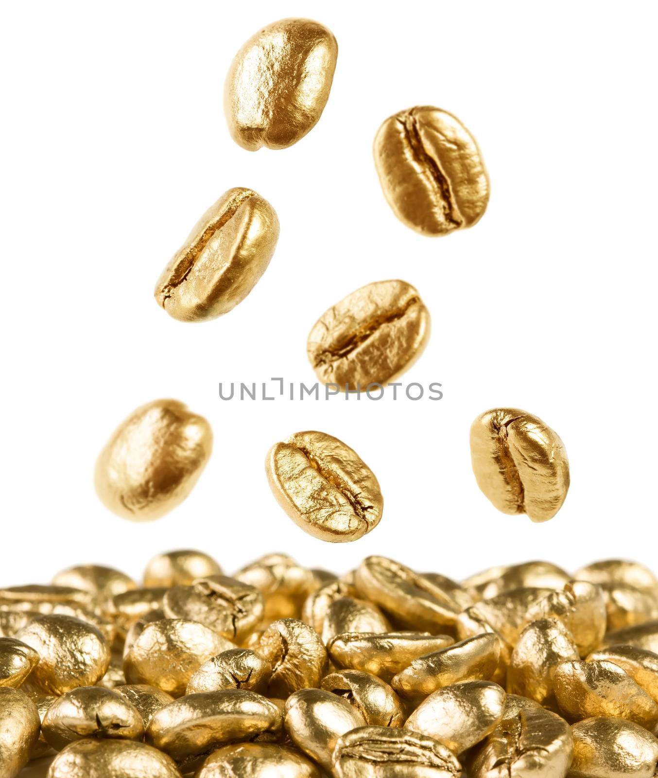 Gold coffee beans on white background falling down