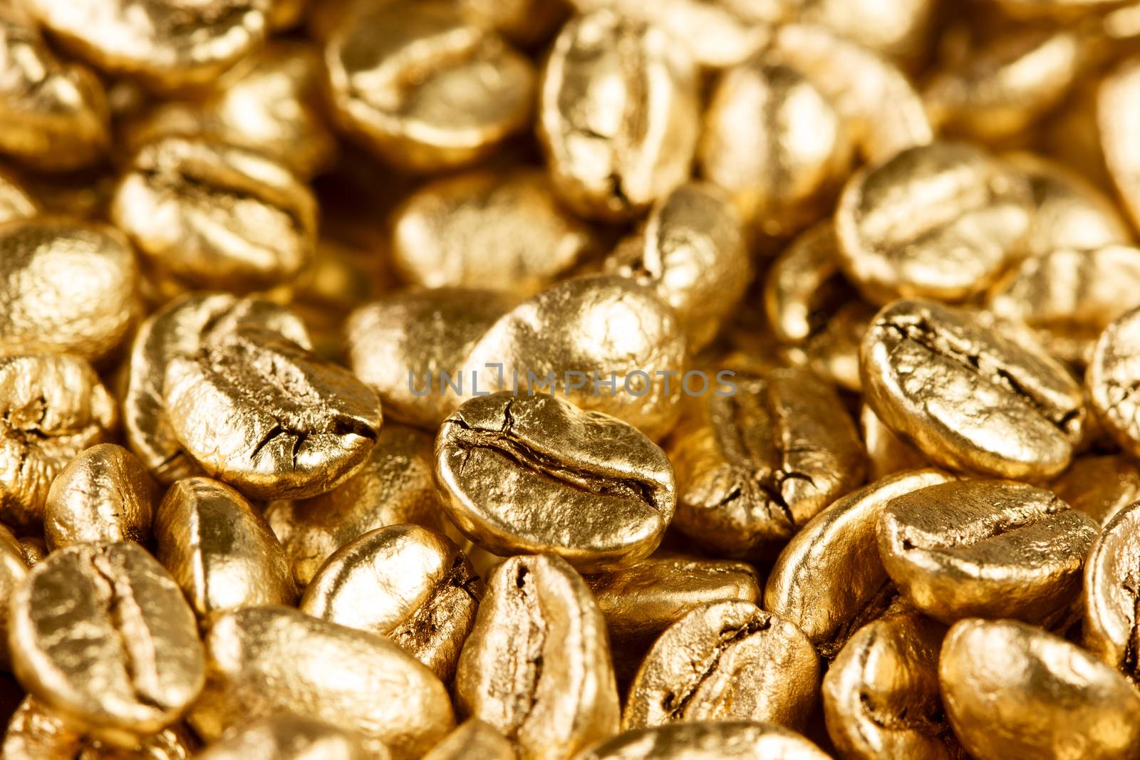 Close up view of gold coffee beans