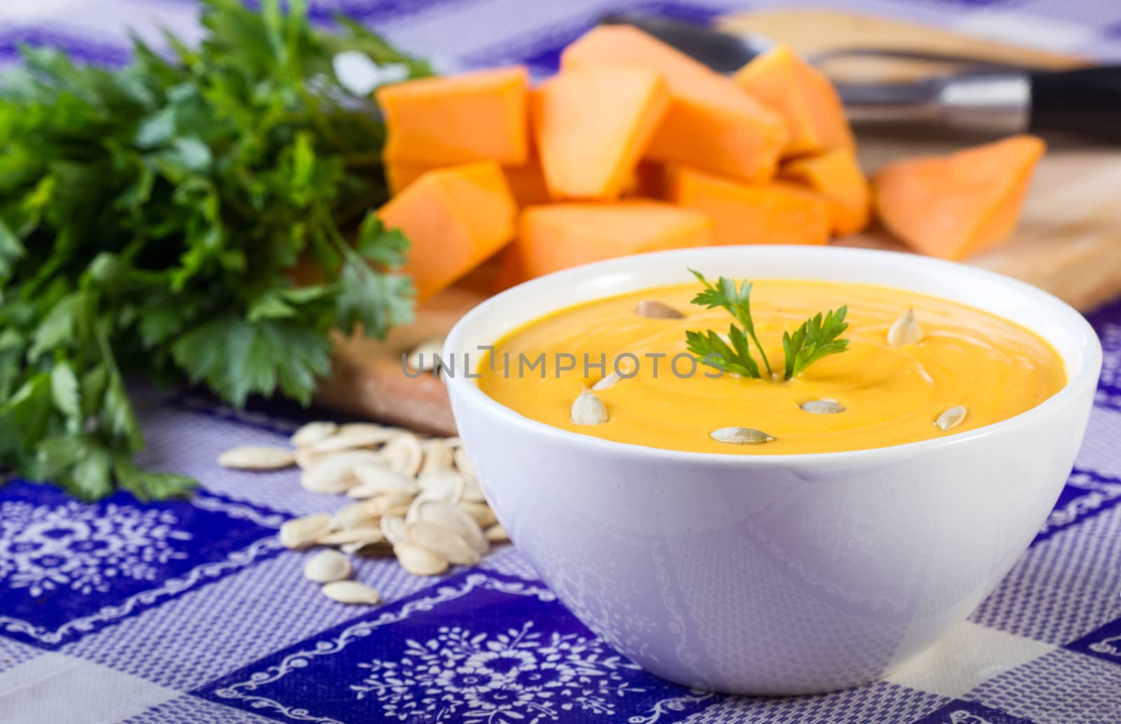 Pumpkin soup with parsley leaf