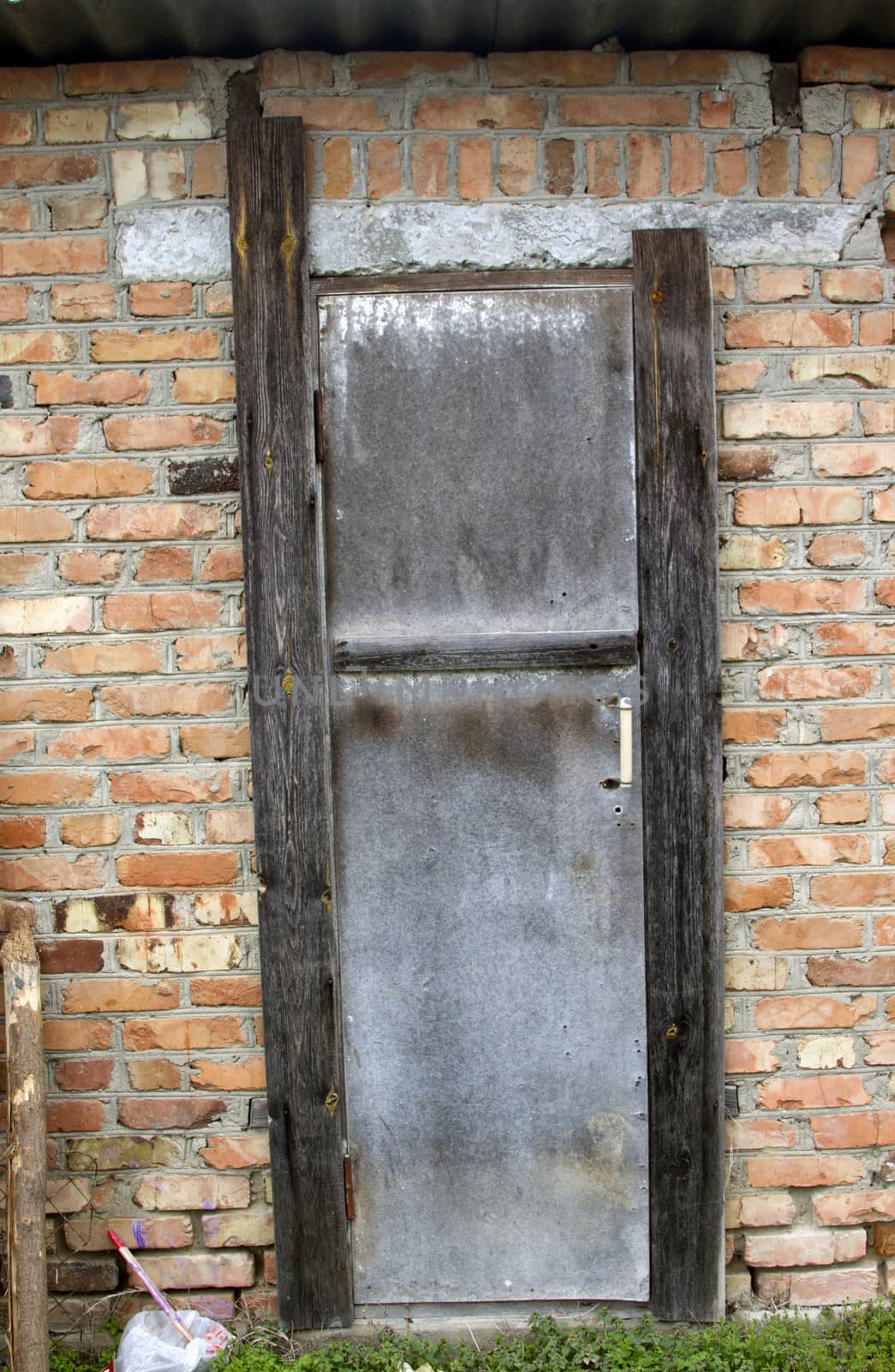 Single Wooden Door in Old City Wall by mcherevan
