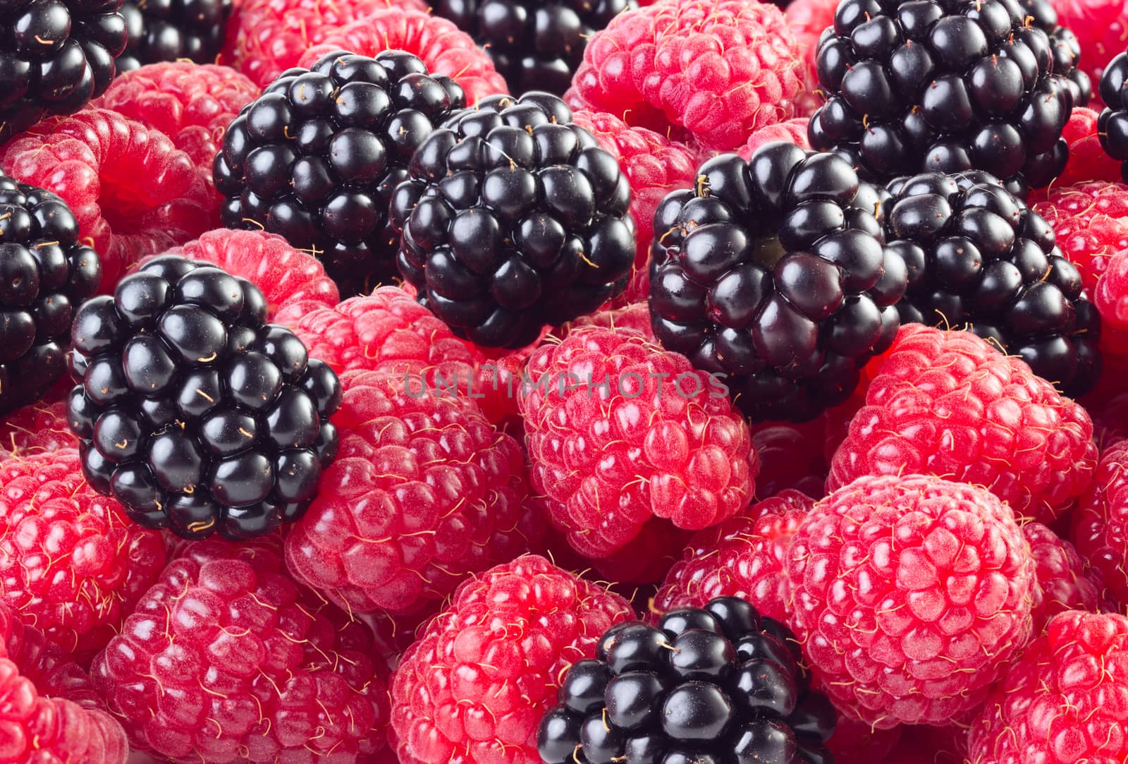 Blackberries and raspberries background