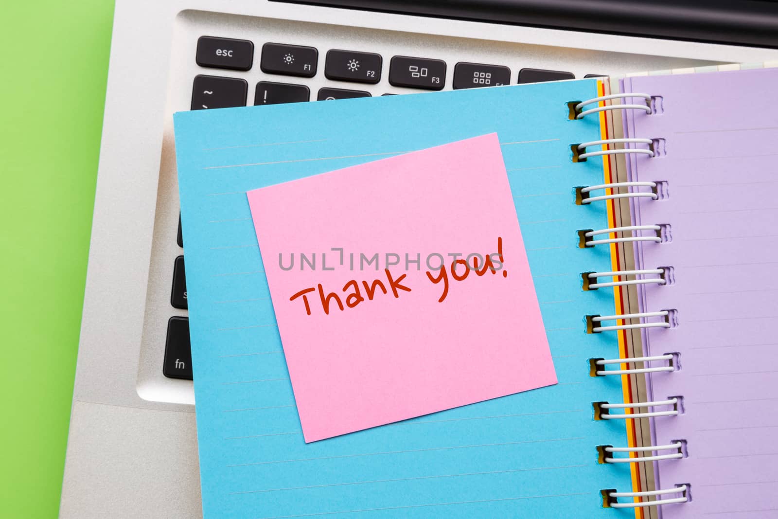Notepad with word " Thank You " on paper book  by vinnstock