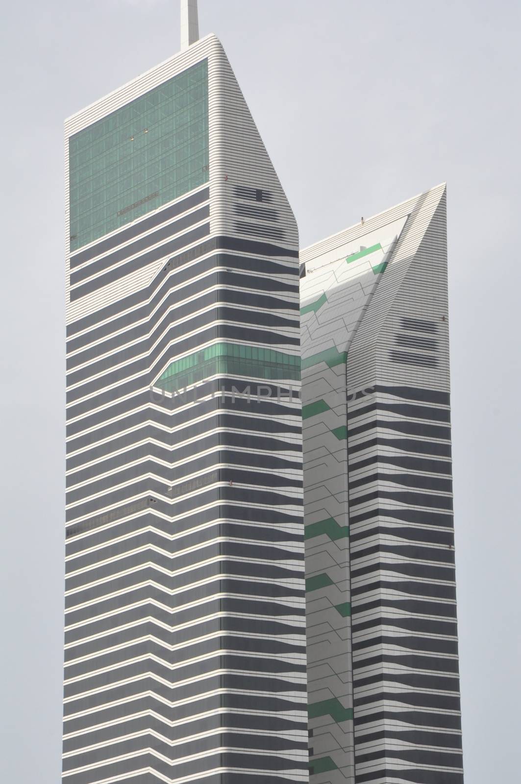 Acico Twin Towers along Sheikh Zayed Road in Dubai, UAE. Nikko Hotel Dubai (JAL Hotel) is the taller tower and Acico Office Tower (Nassima Tower) is shorter.
