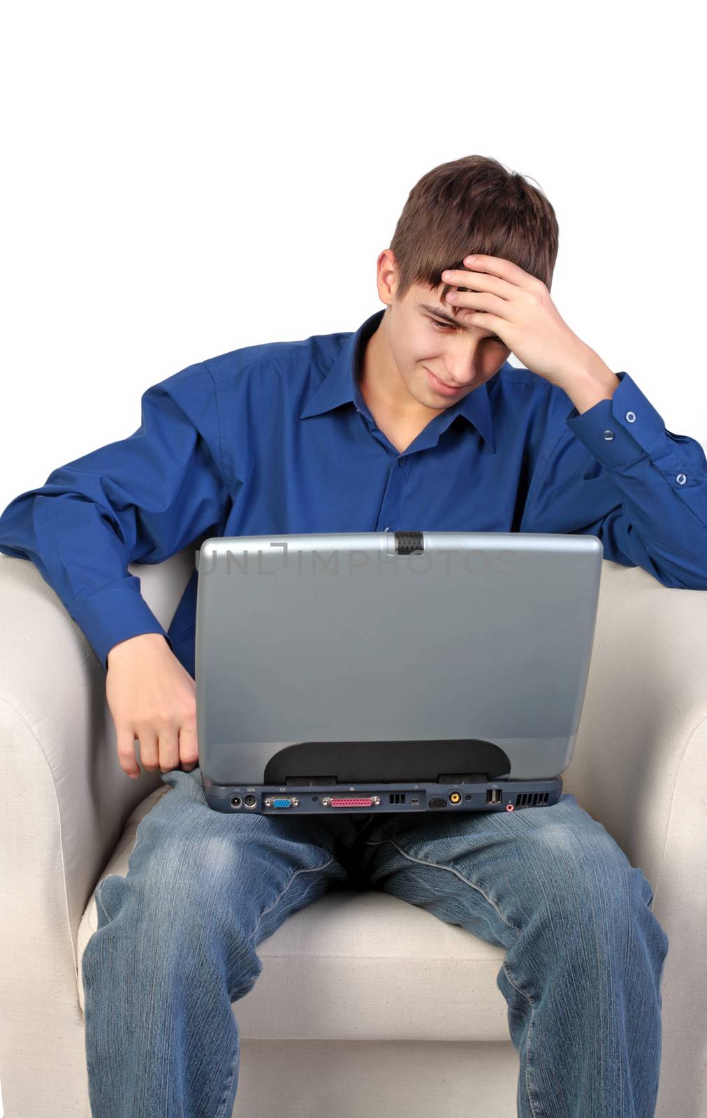 Stressed Teenager with Laptop on the White Background