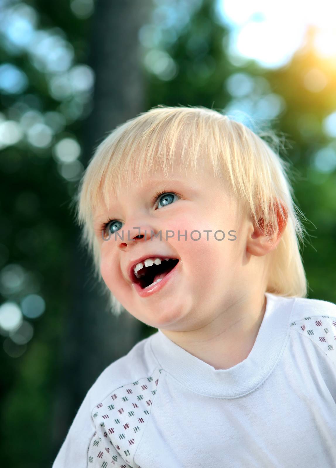 Cheerful Child Portrait at the Summer Park