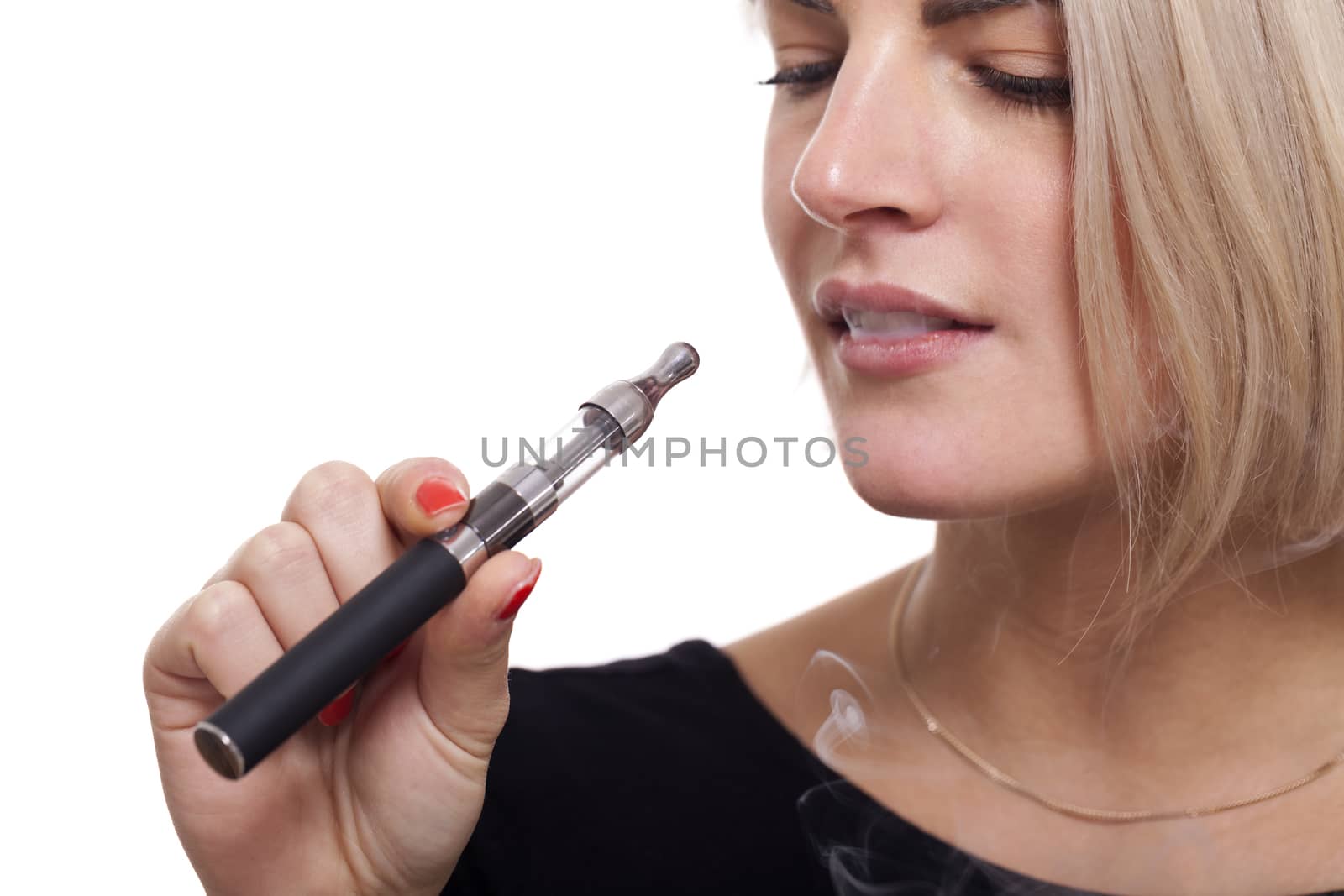 Close up Serious Facial Expression of a Young Blond Woman Smoking Using E- Cigarette on a White Background