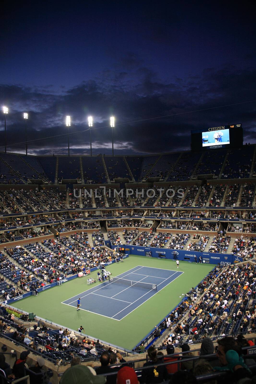 A crowded Arthur Ashe Stadium for a night U.S. Open tennis match in Queens, New York City