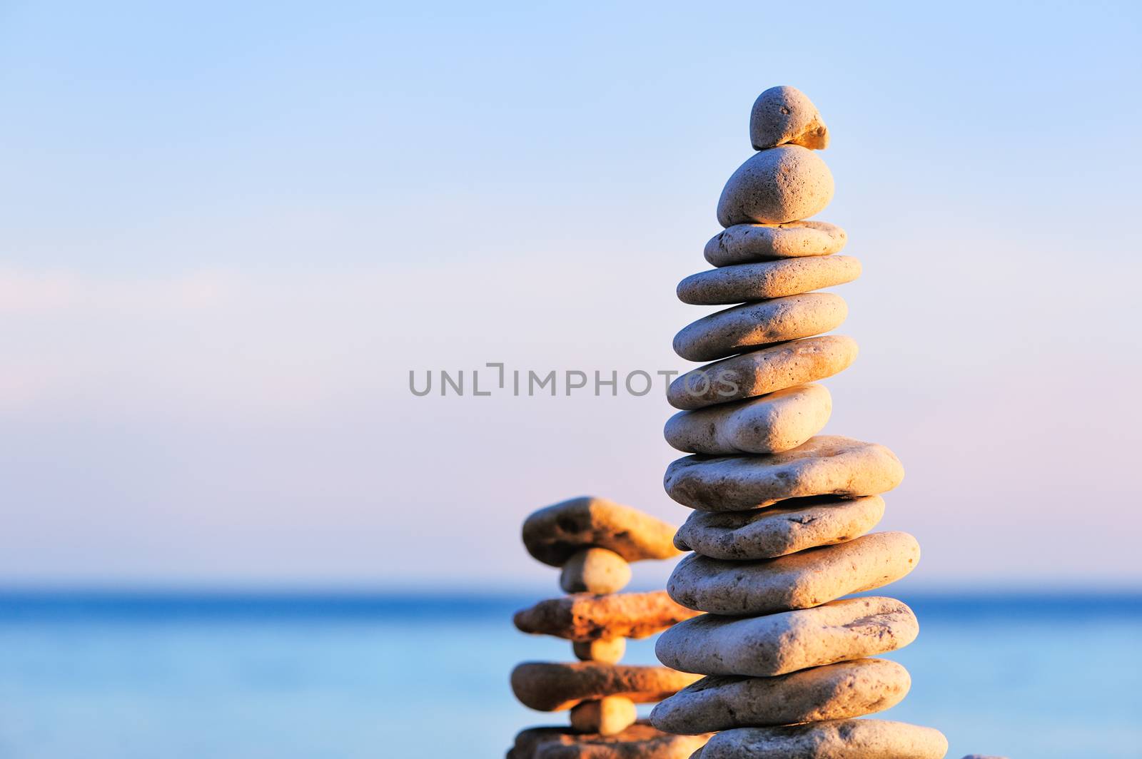 Balancing of stones each other on the seashore