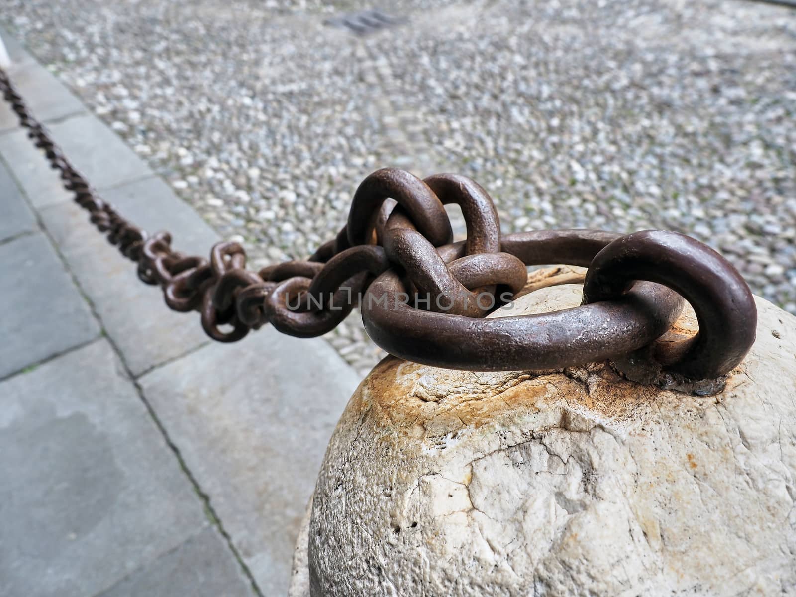 Old rusty anchored Iron Chain by rigamondis