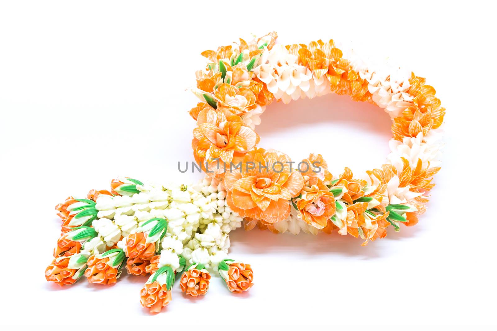 Orange garland flower in Thai style, isolated on white background, used offering to buddha