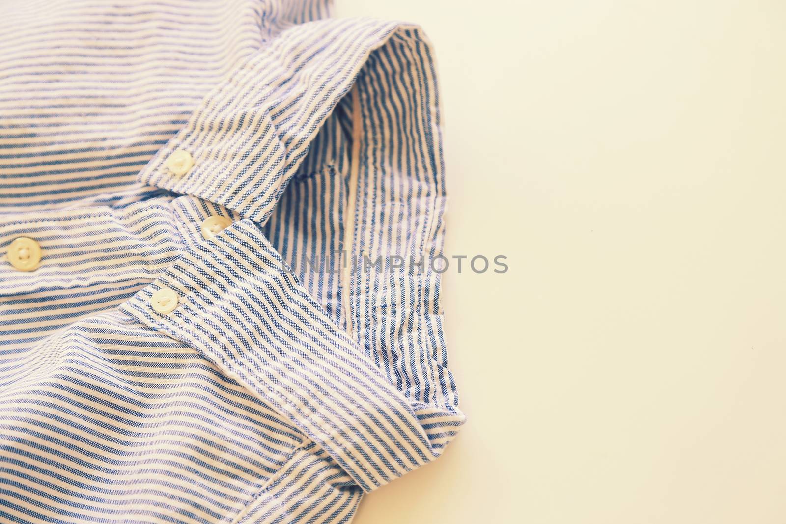 Fashion. Striped shirt in the wardrobe