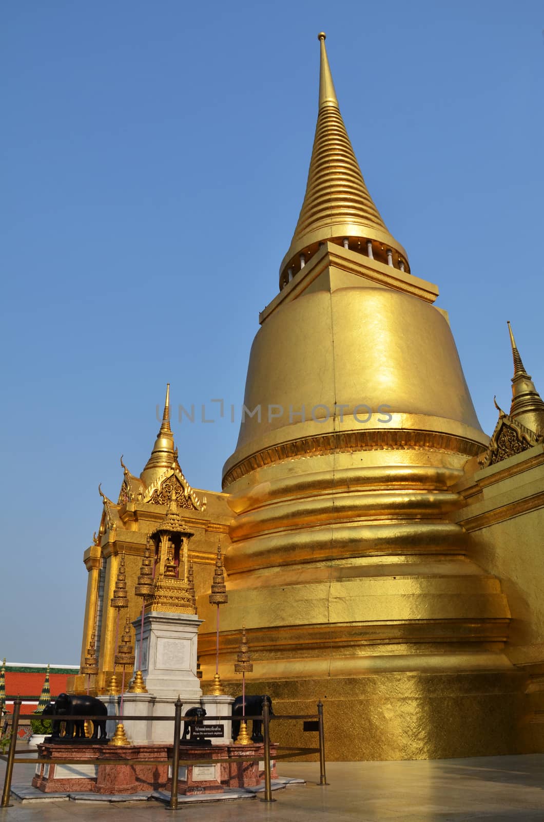 Golden pagoda in Grand Palace by tang90246