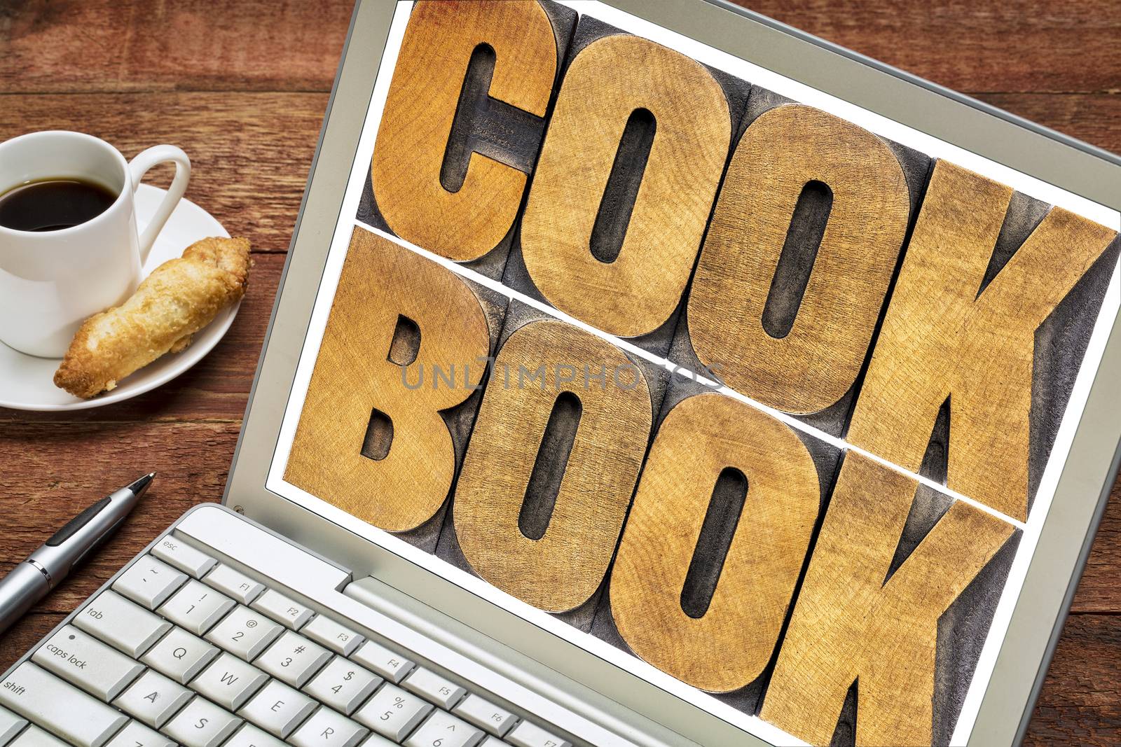 cookbook word abstract on laptop screen by PixelsAway