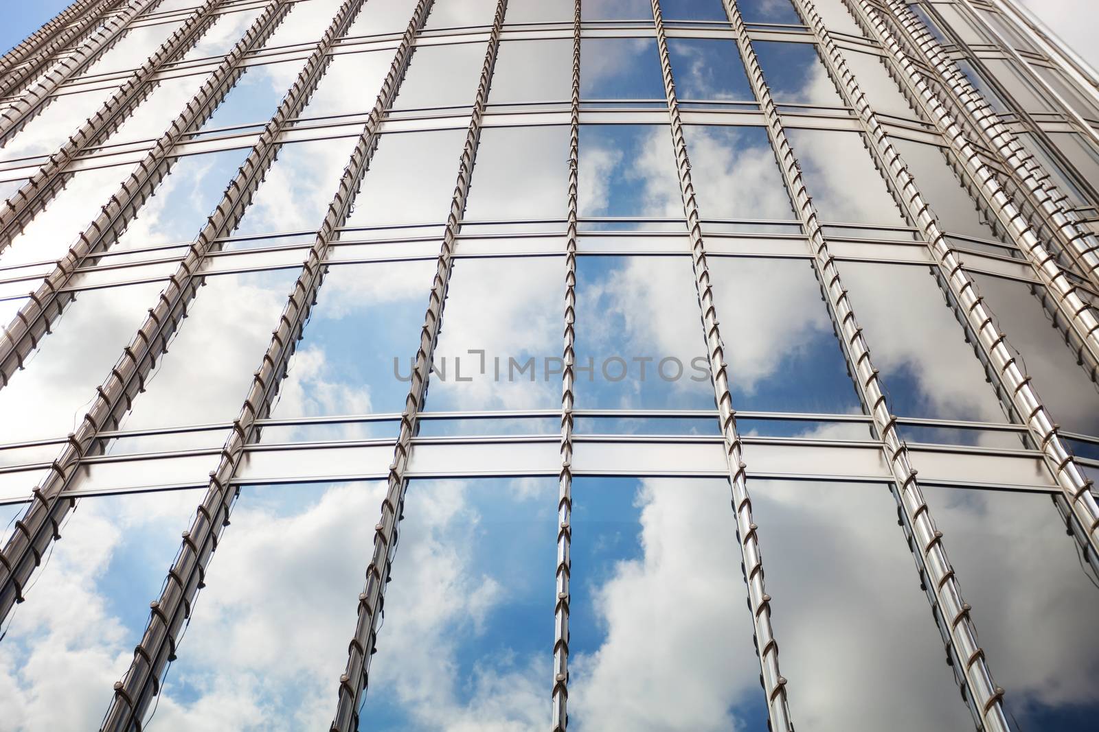 Clouds reflected the glass surface of Burj Khalifa by photobac