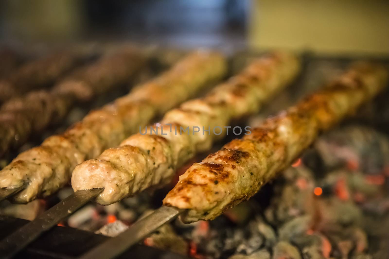 tikka, shish and kofta kebabs on charcoal barbecue