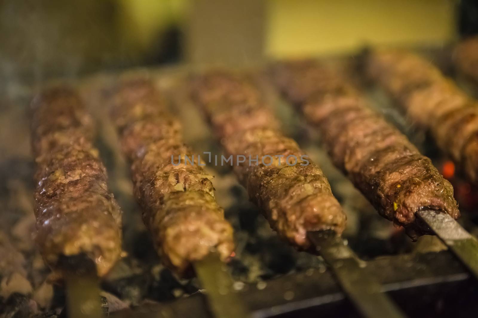 tikka, shish and kofta kebabs on charcoal barbecue