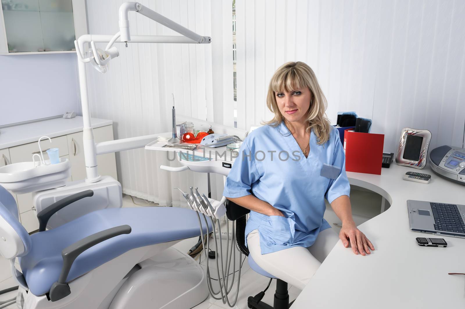 dentist office interior with female doctor by starush