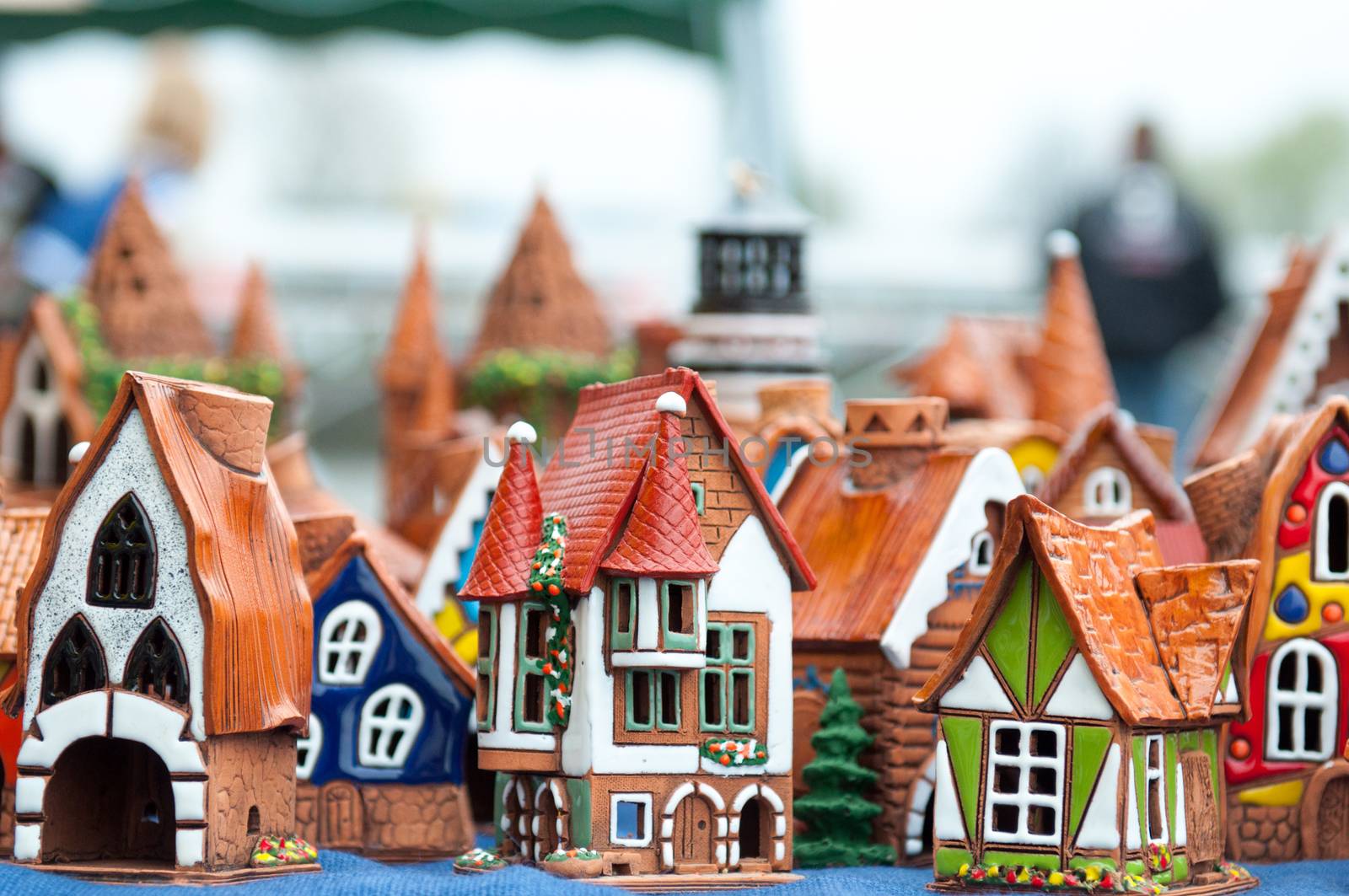 Many ceramic toys for children. Souvenirs. Building houses and lighthouses.
