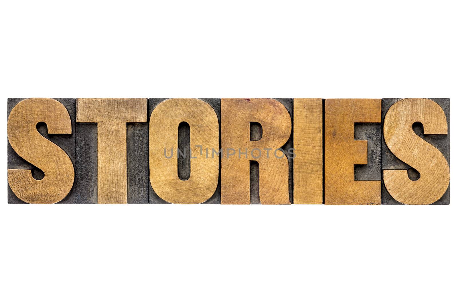 stories word in wood type by PixelsAway