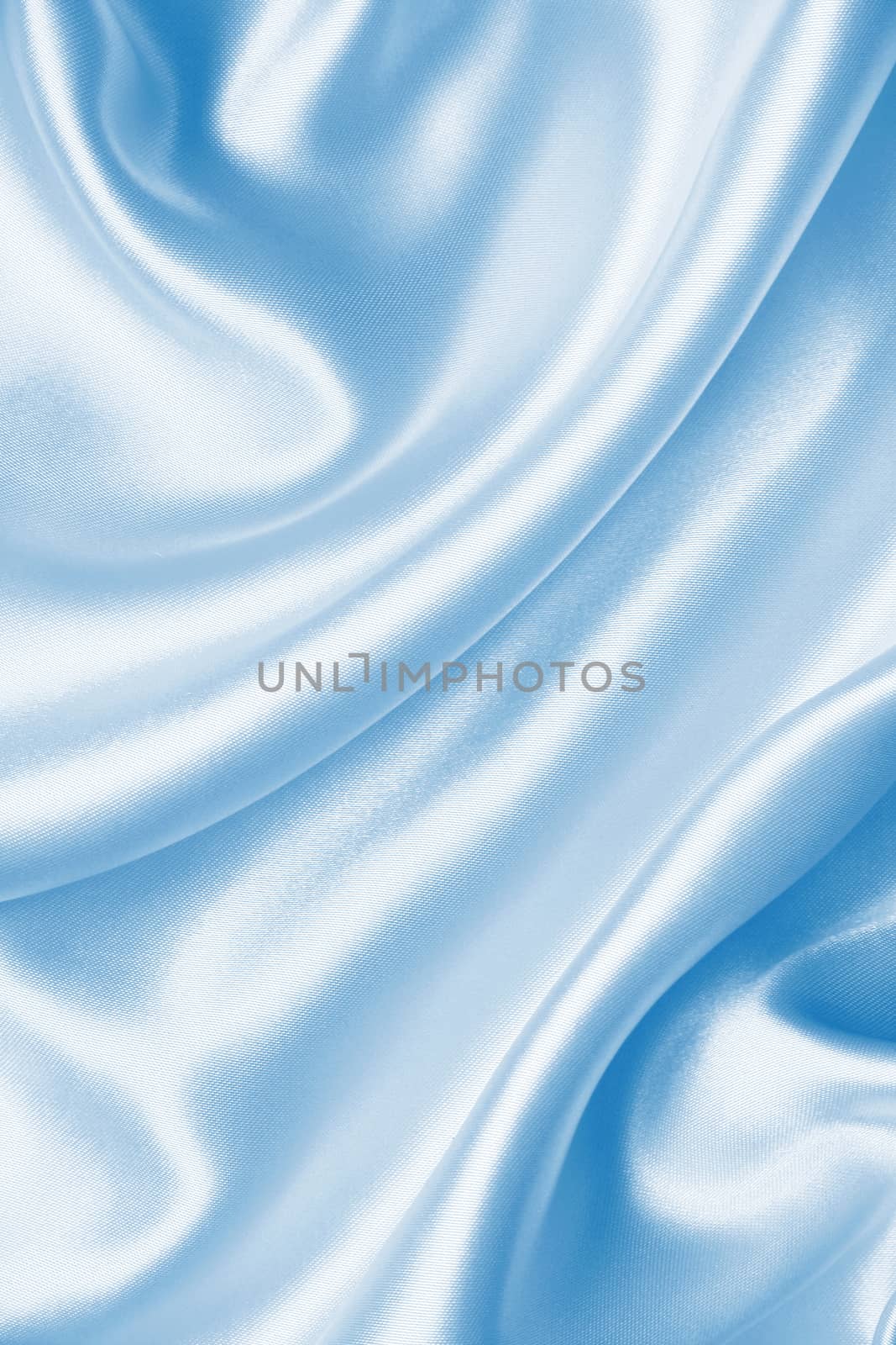 Smooth elegant blue silk or satin can use as background