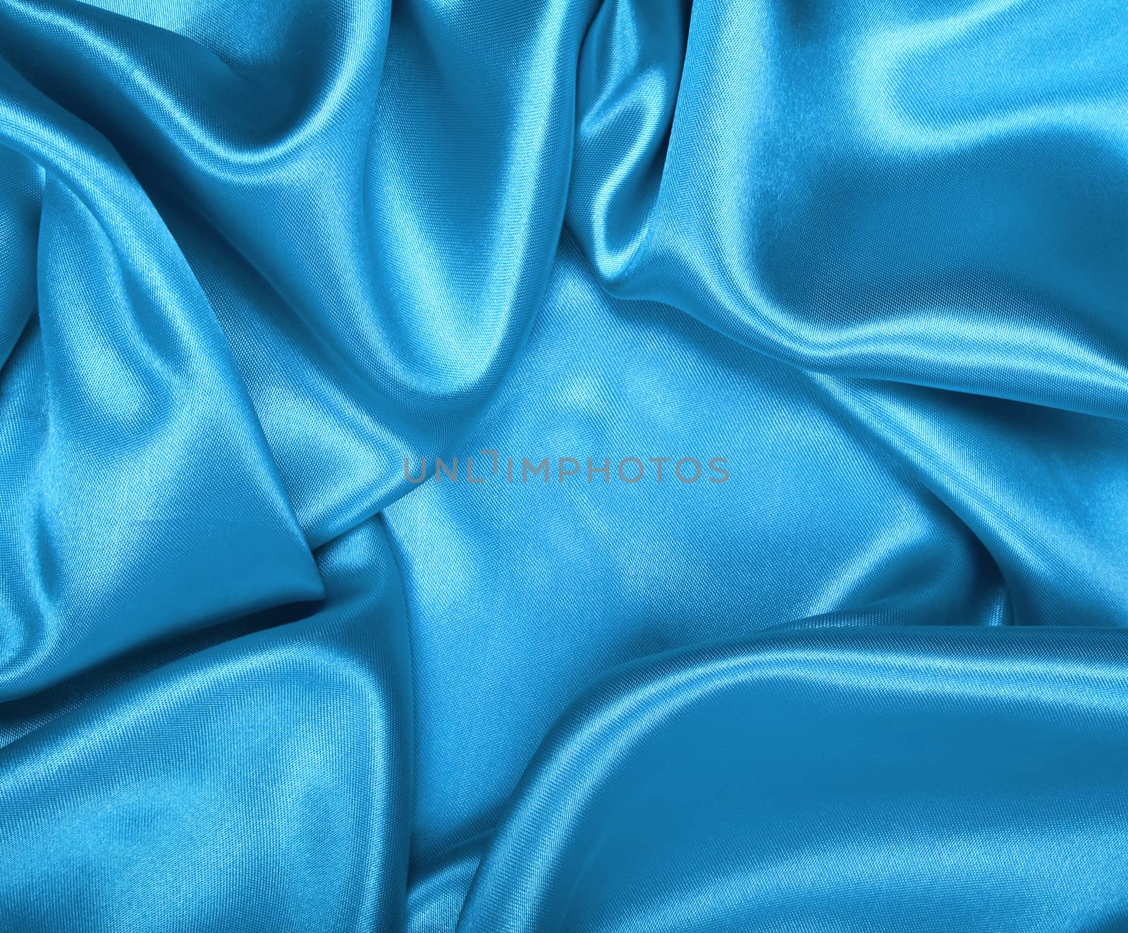 Smooth elegant blue silk or satin as background  by oxanatravel