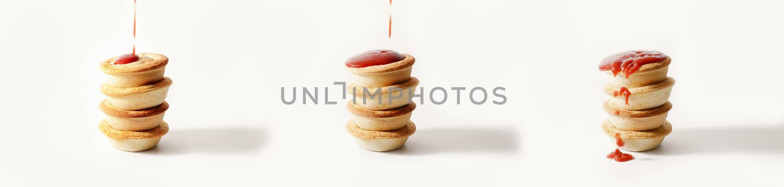 Stack of meat pies freshly baked.