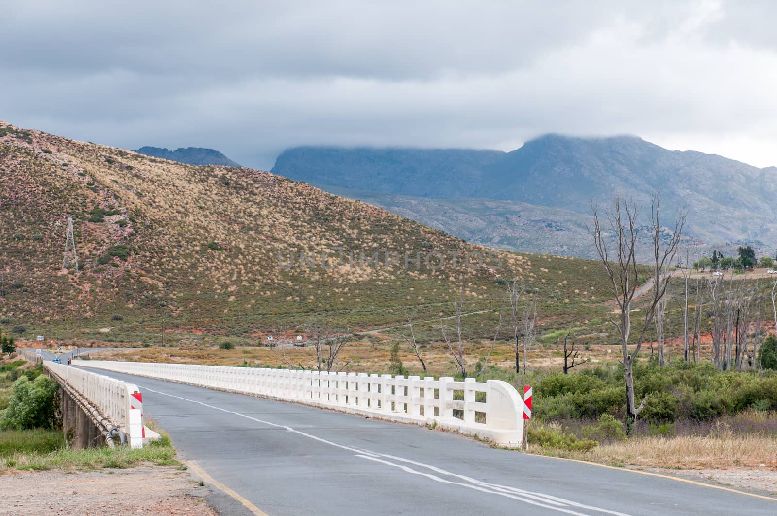 WORCESTER, SOUTH AFRICA - DECEMBER 2, 2014: Bridge over the Breede River between Rawsonville and Worcester with the Hawequas Mountains in the back