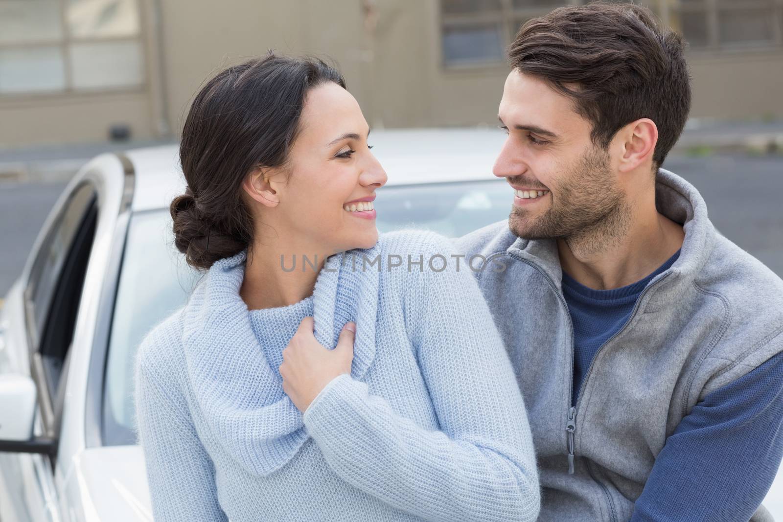 Young couple smiling at each other by Wavebreakmedia