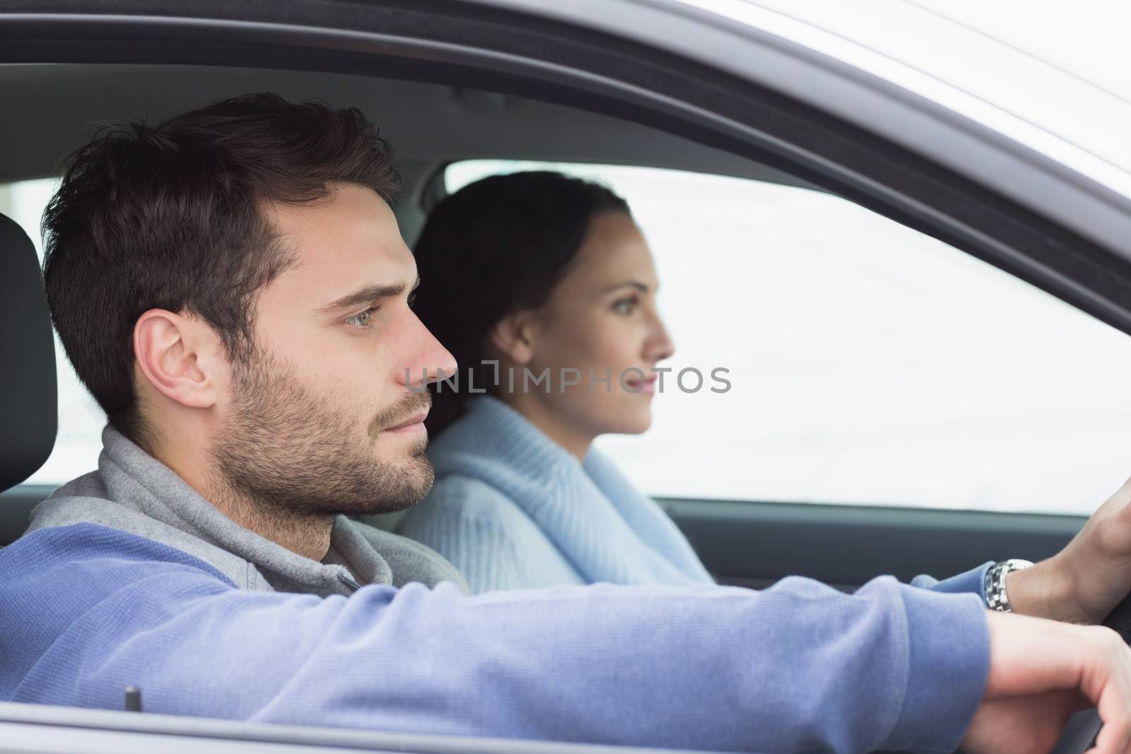 Young couple going for a drive by Wavebreakmedia