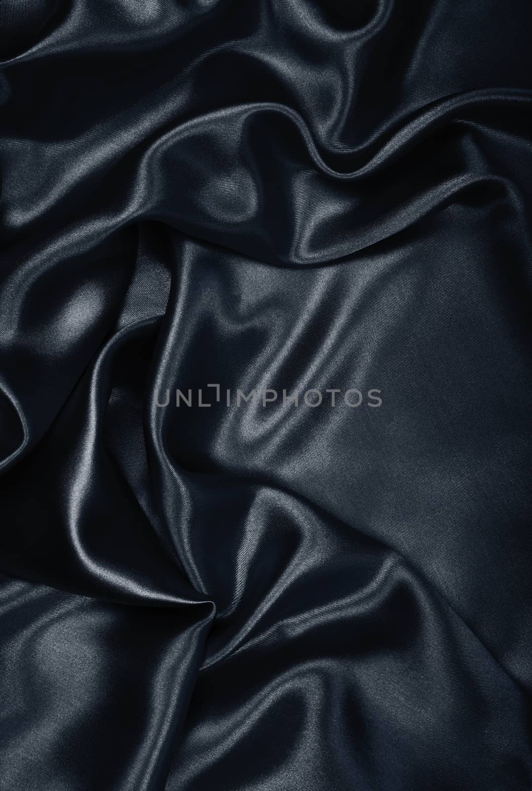 Smooth elegant black silk or satin can use as background 