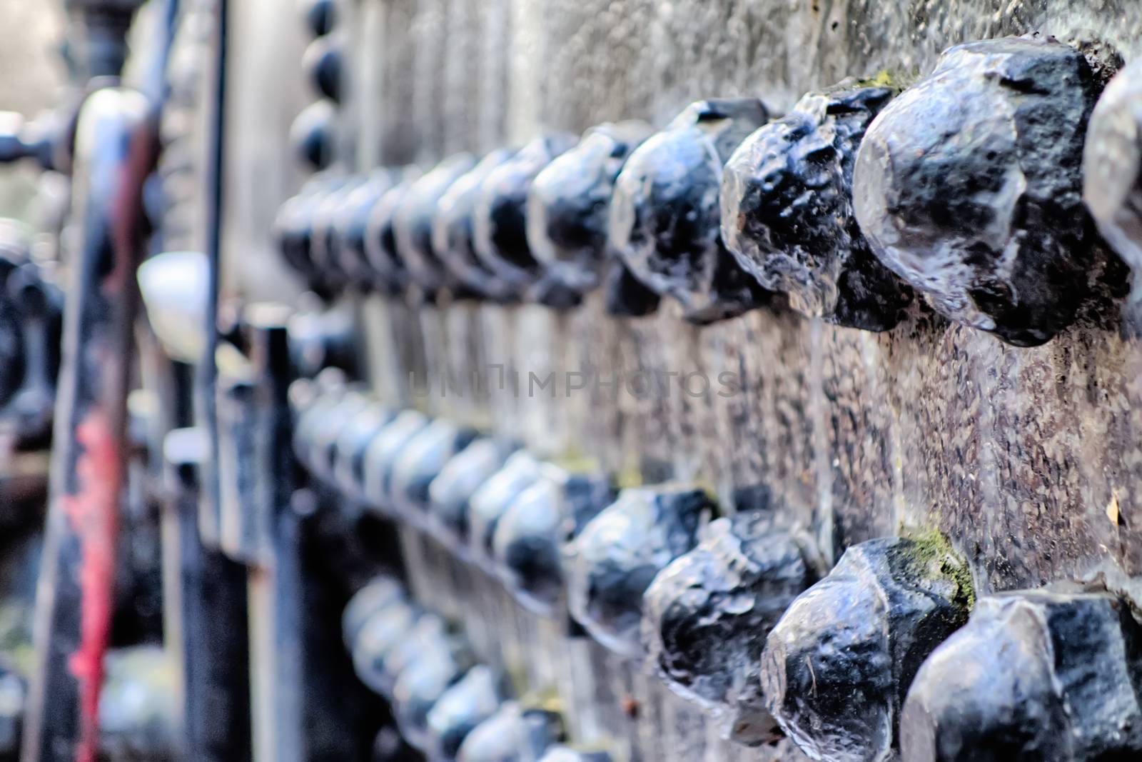 Industrial abstract background texture with black steel structure with bolts and rivets