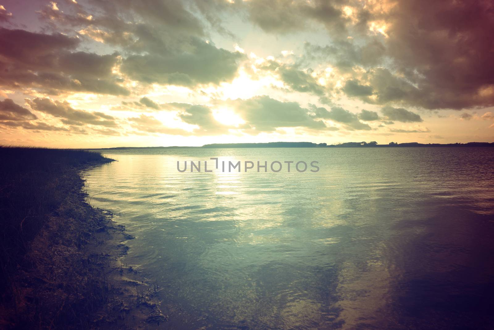 Calm lagoon retro colors landscape at sunset. Chill out concept photography.