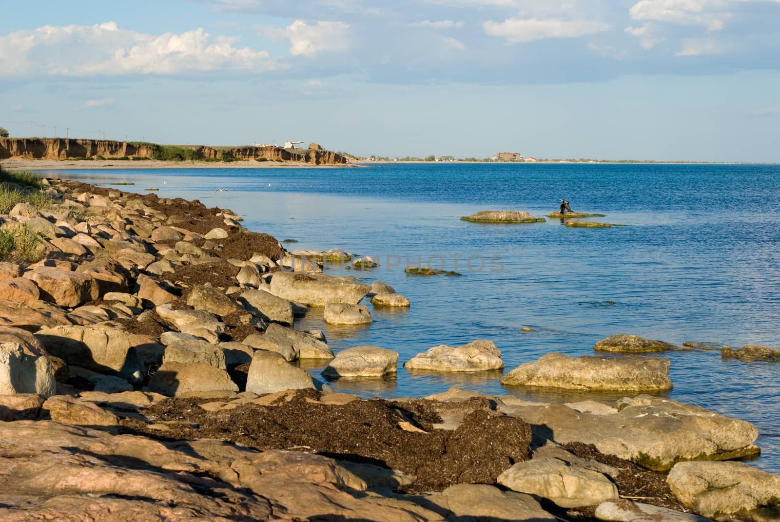 The Black Sea coast, rocks, cloudy sky (summer day).