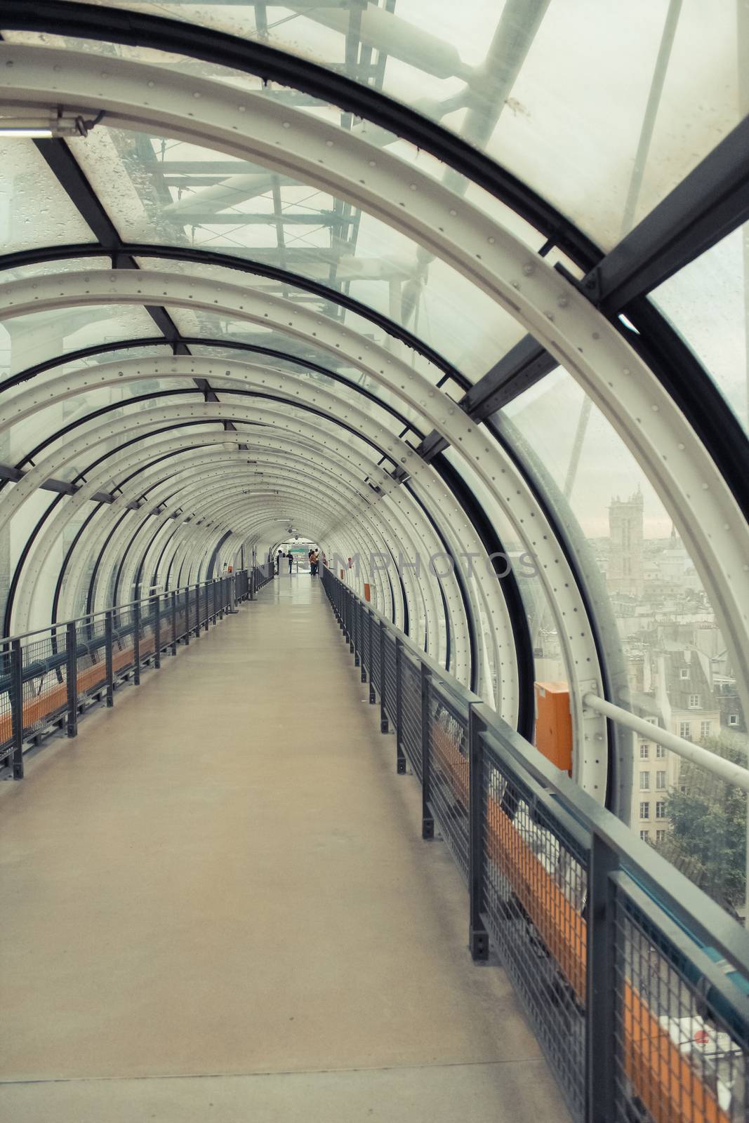 Glass conduit at Pompidou Centre in Paris France. Instagram style filtred image