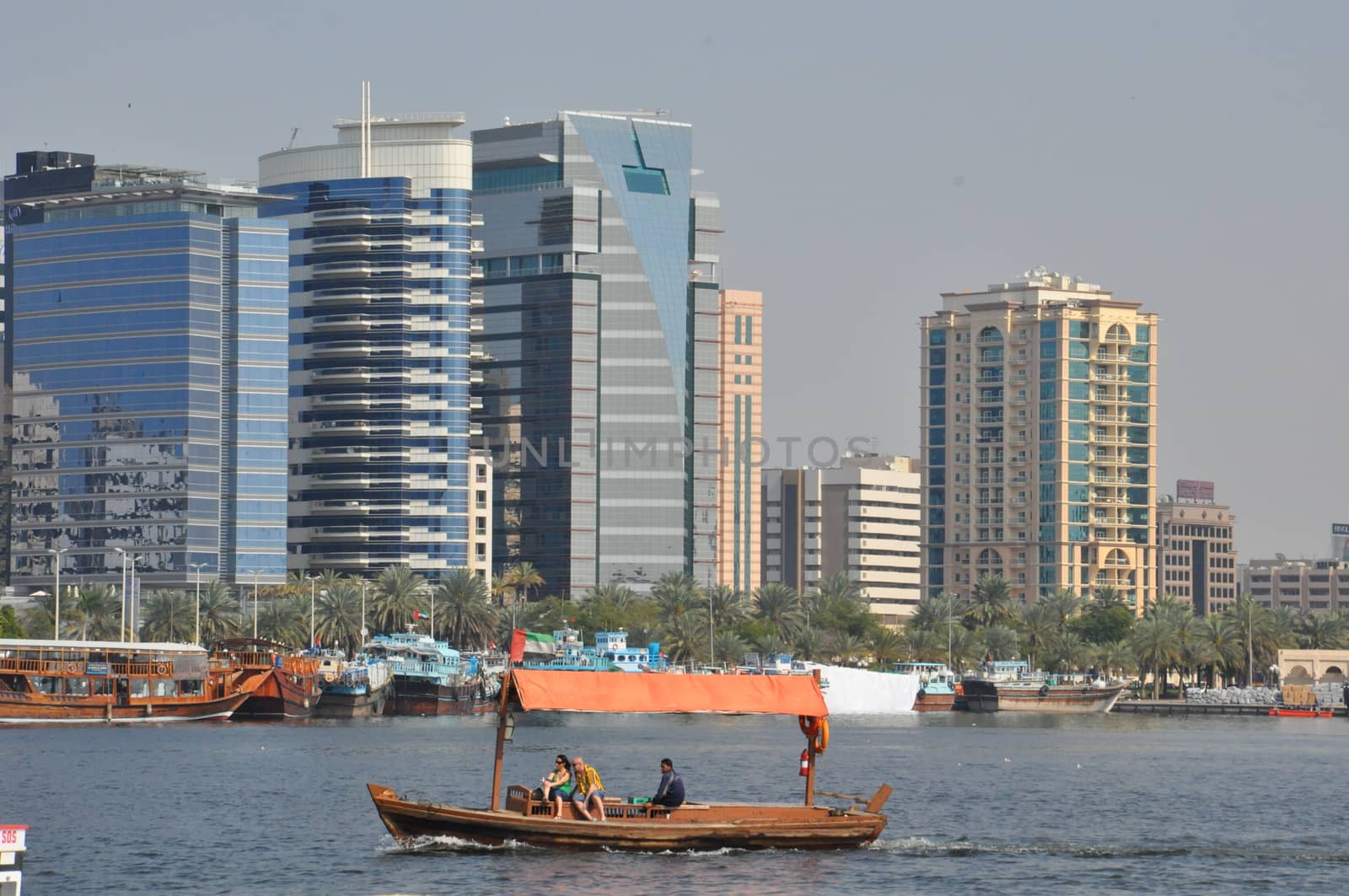 Dubai Creek in Dubai, UAE. The notable buildings along the Deira Creek are Deira Twin Towers, Dubai Creek Tower, National Bank, and Chamber of Commerce.