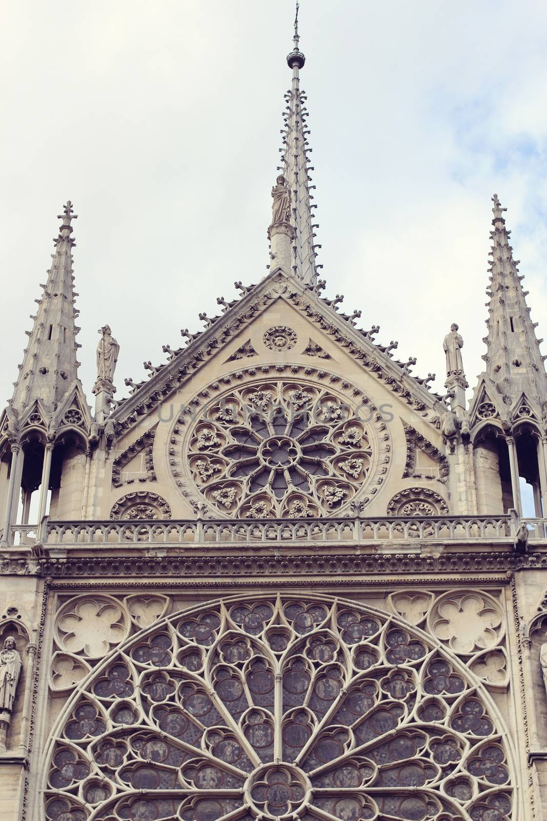 Architectural details of Cathedral Notre Dame de Paris. Cathedral Notre Dame de Paris - most famous Gothic, Roman Catholic cathedral on the eastern half of the Cite Island. France, Europe.
