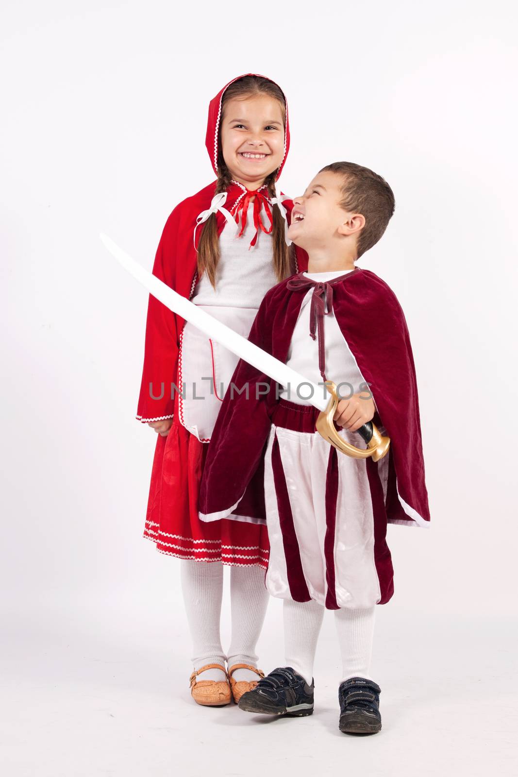 Girl and boy in costumes from fairy tales by maros_b