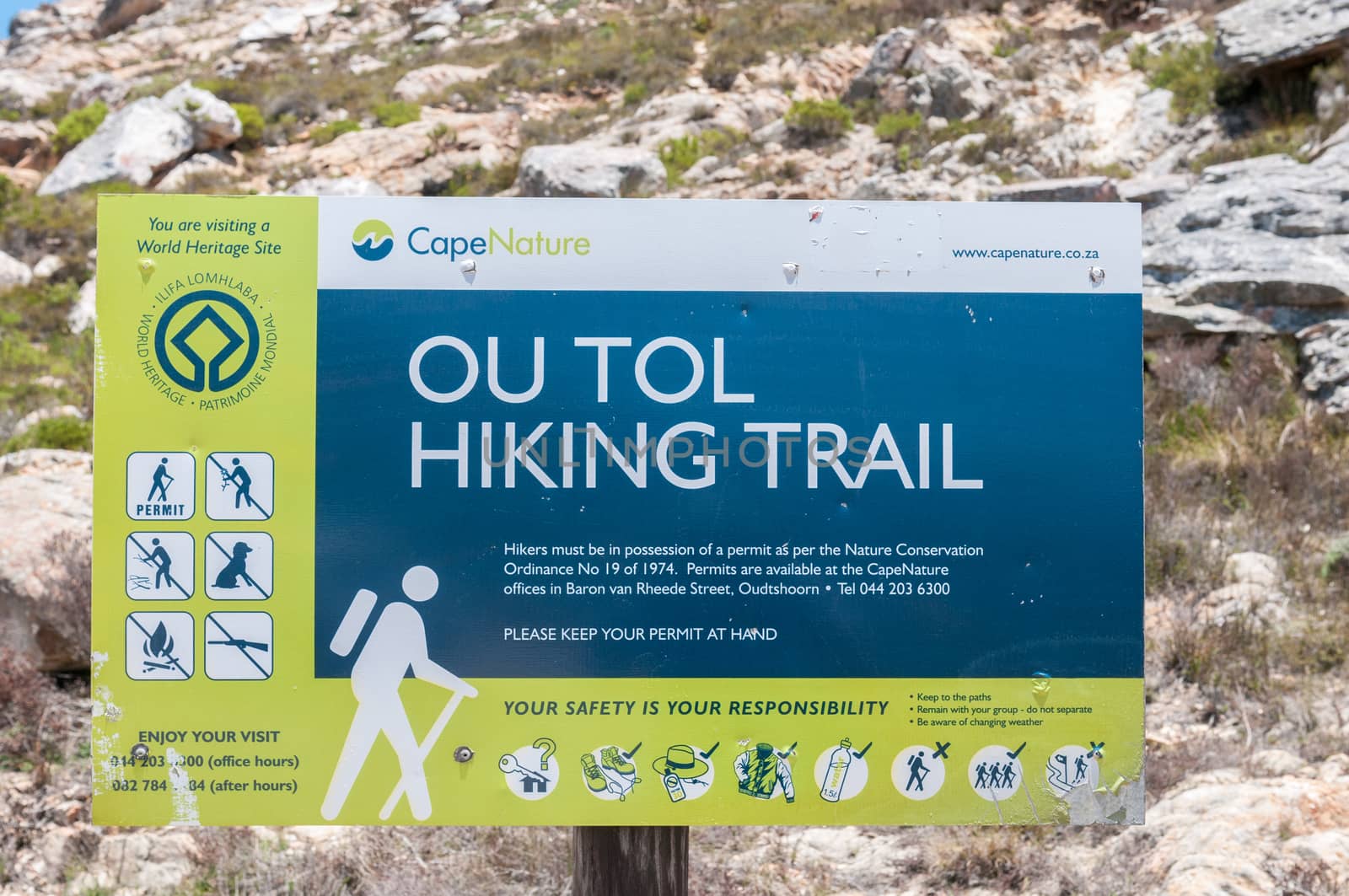 SWARTBERG PASS, SOUTH AFRICA - JANUARY 2, 2015: Ou Tol Hiking Trail sign in the historic Swartberg (Black Mountain) Pass.