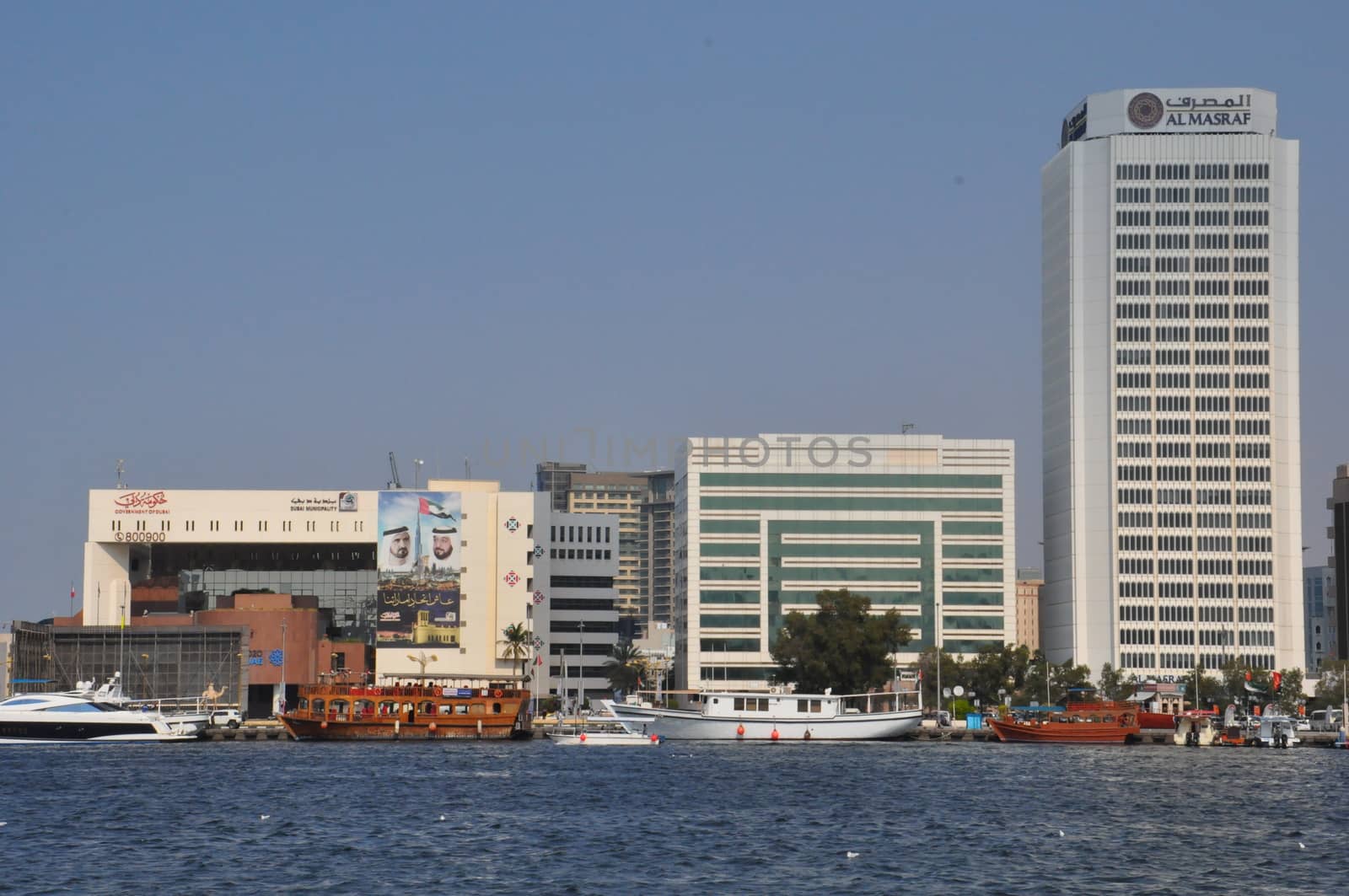 Dubai Creek in Dubai, UAE. The notable buildings along the Deira Creek are Deira Twin Towers, Dubai Creek Tower, National Bank, and Chamber of Commerce.