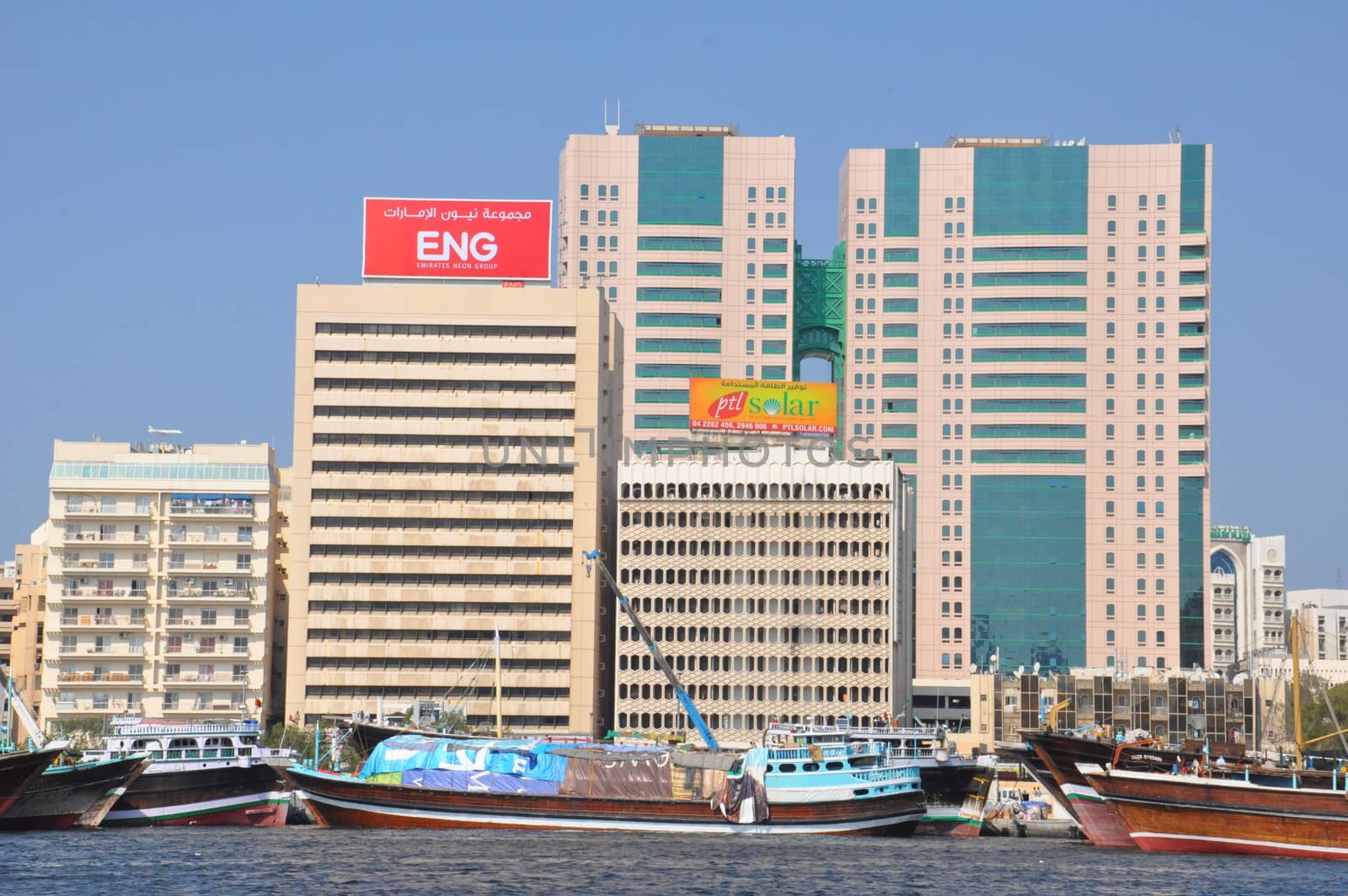 Dubai Creek in Dubai, UAE. The notable buildings along the Deira Creek are Deira Twin Towers, Dubai Creek Tower, National Bank, and Chamber of Commerce.