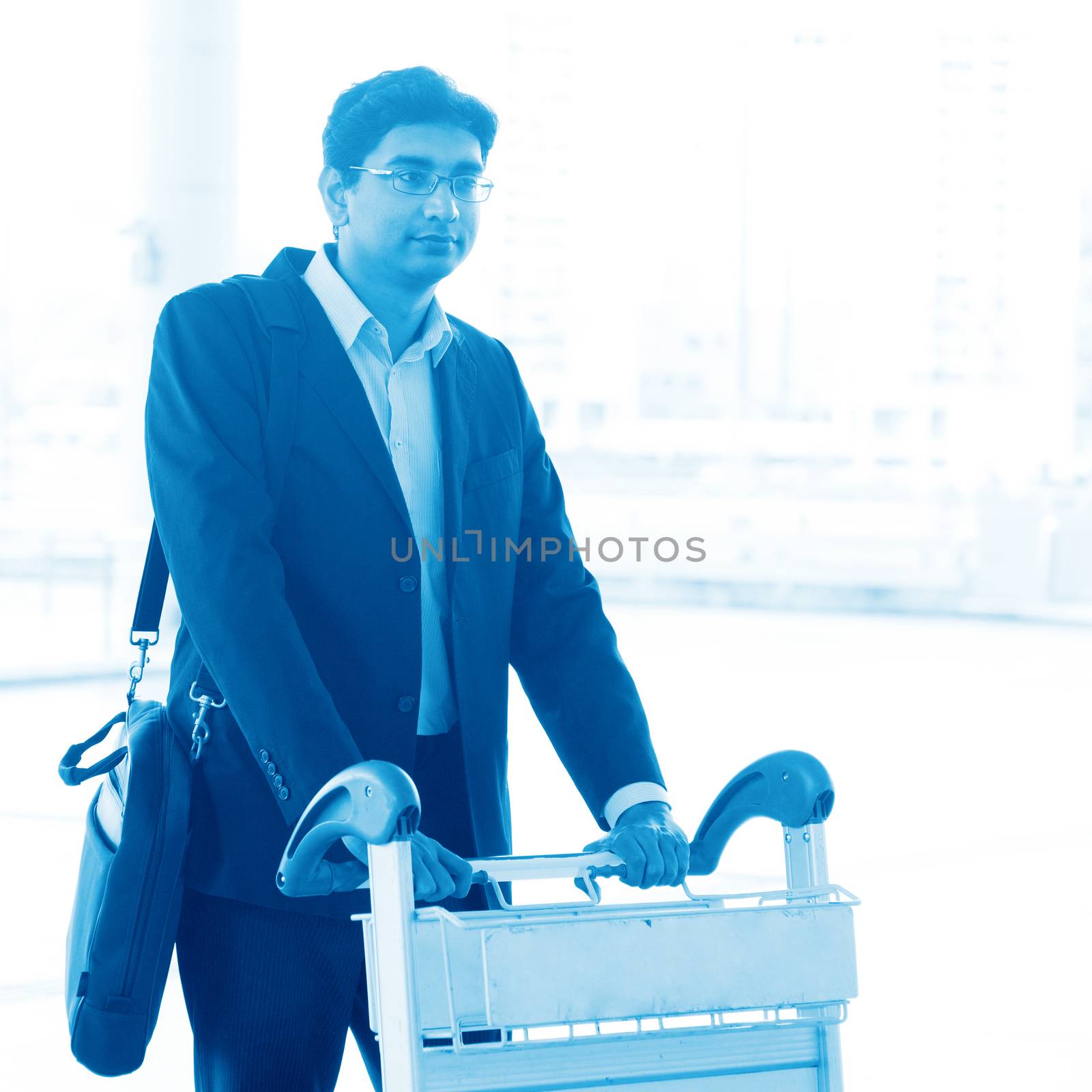 Man walking with airport trolley by szefei