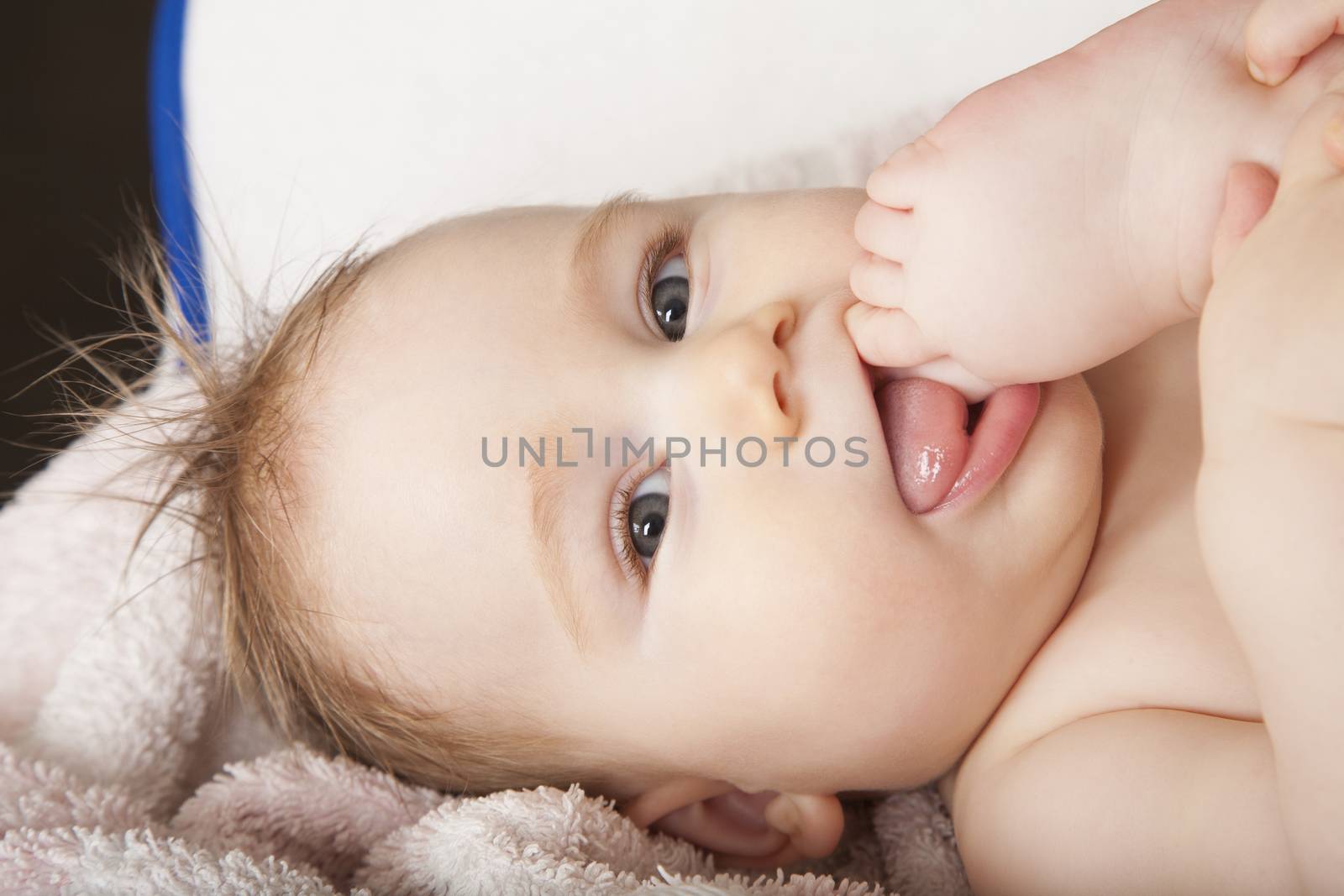 baby foot on mouth by quintanilla