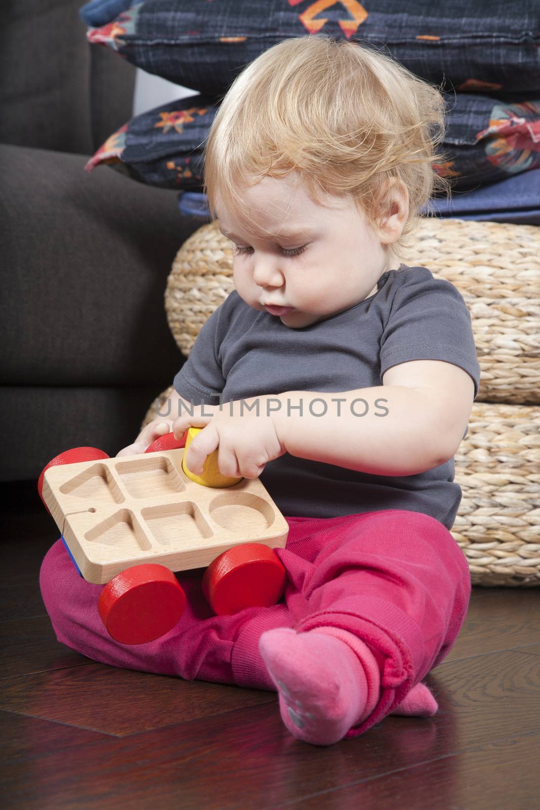 baby placing forms by quintanilla