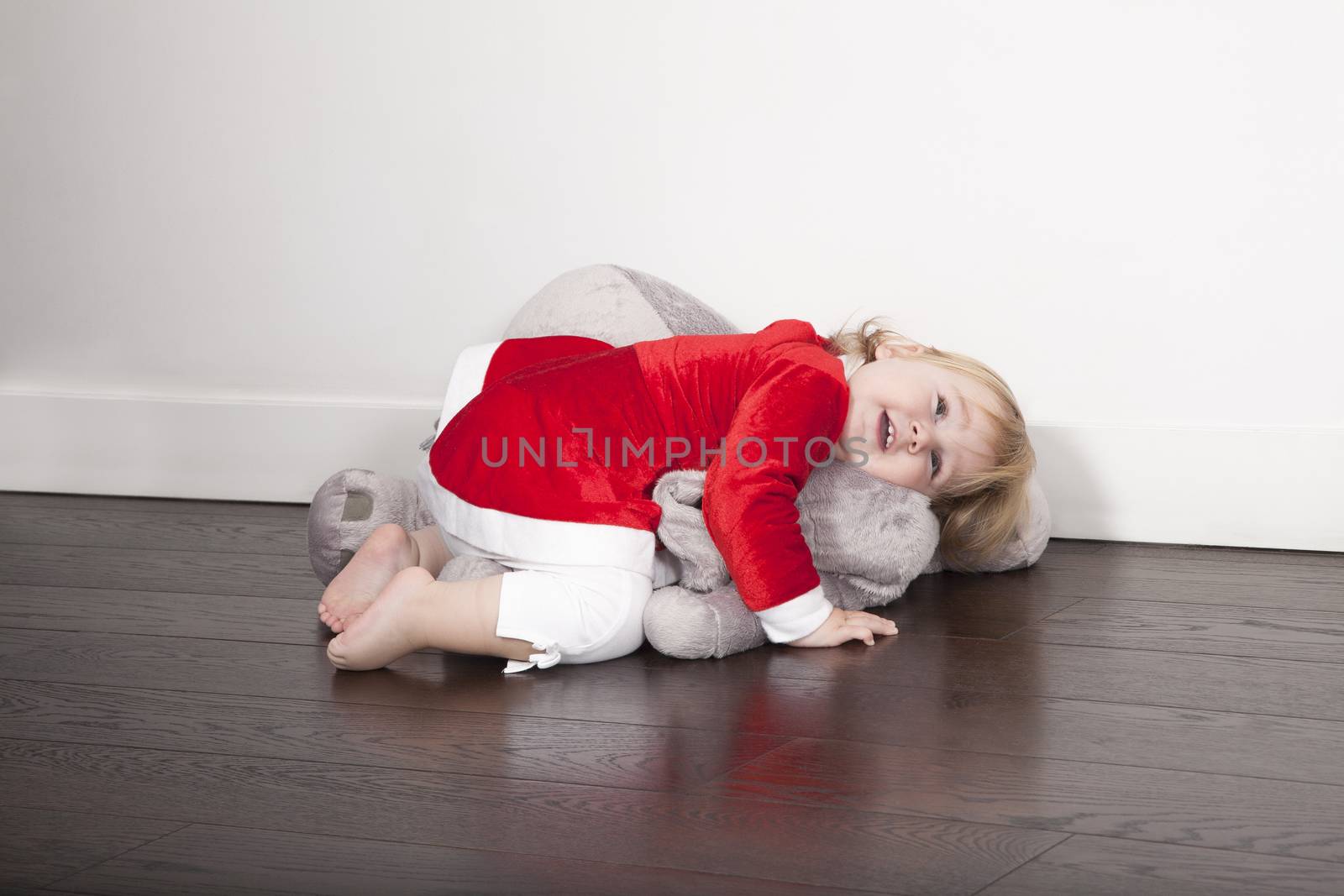 baby santa claus embraced plush doll by quintanilla