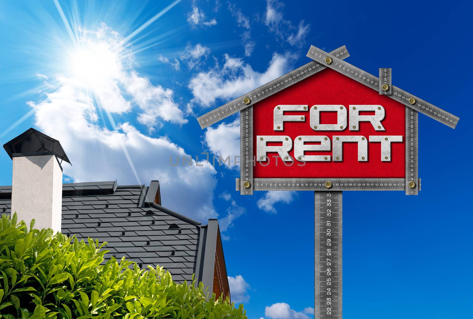 Grey metallic meter ruler in the shape of house with text for rent. For rent real estate sign on blue sky with roof, clouds and sun rays