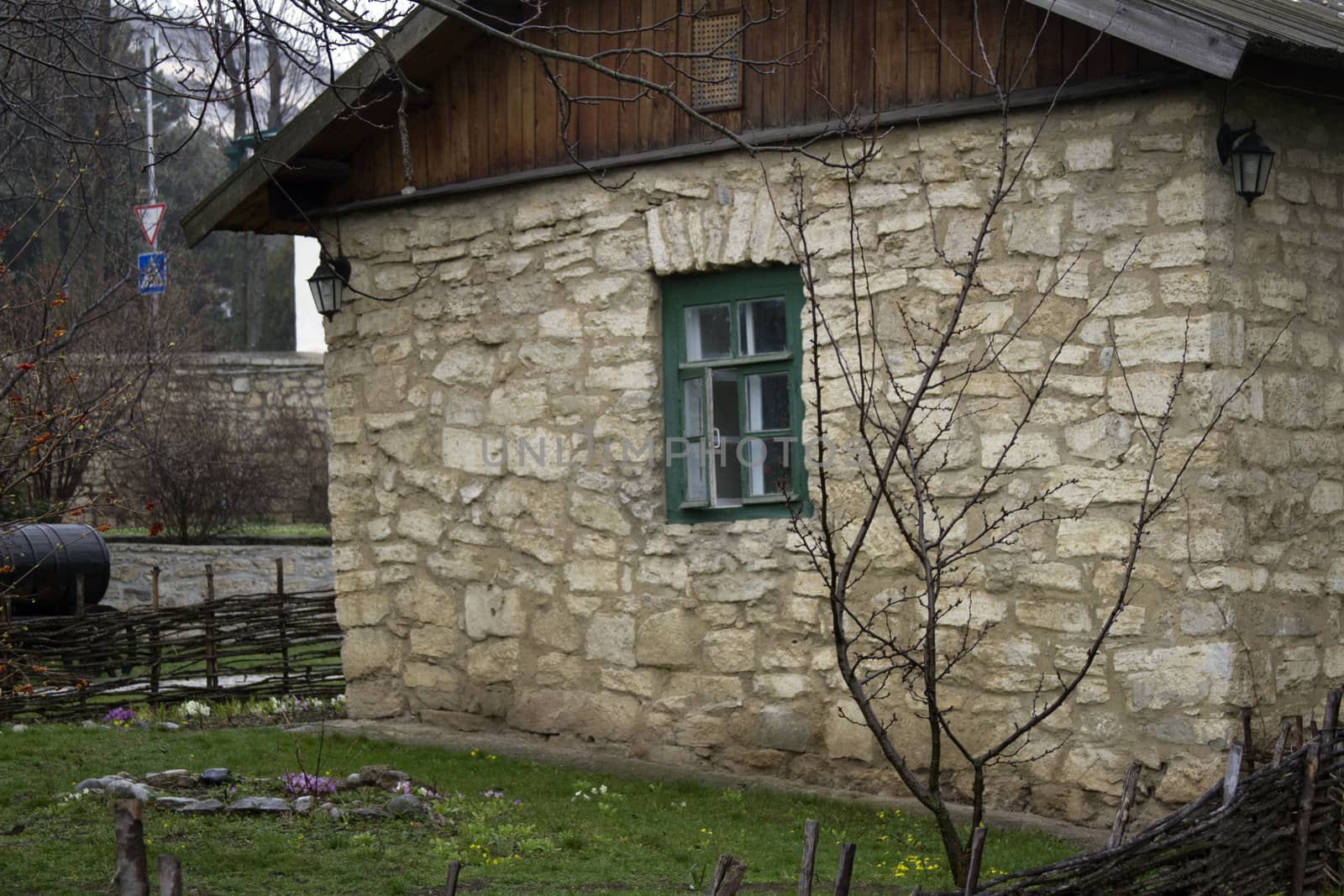 Old village house with a beautiful open window by mcherevan