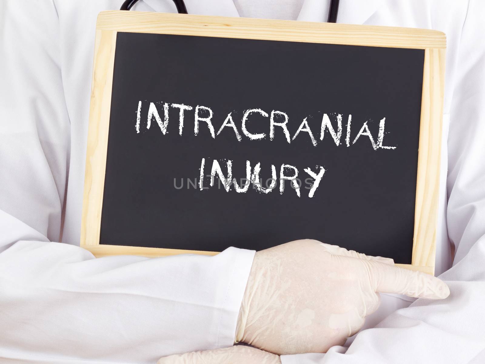 Doctor shows information on blackboard: intracranial injury by gwolters